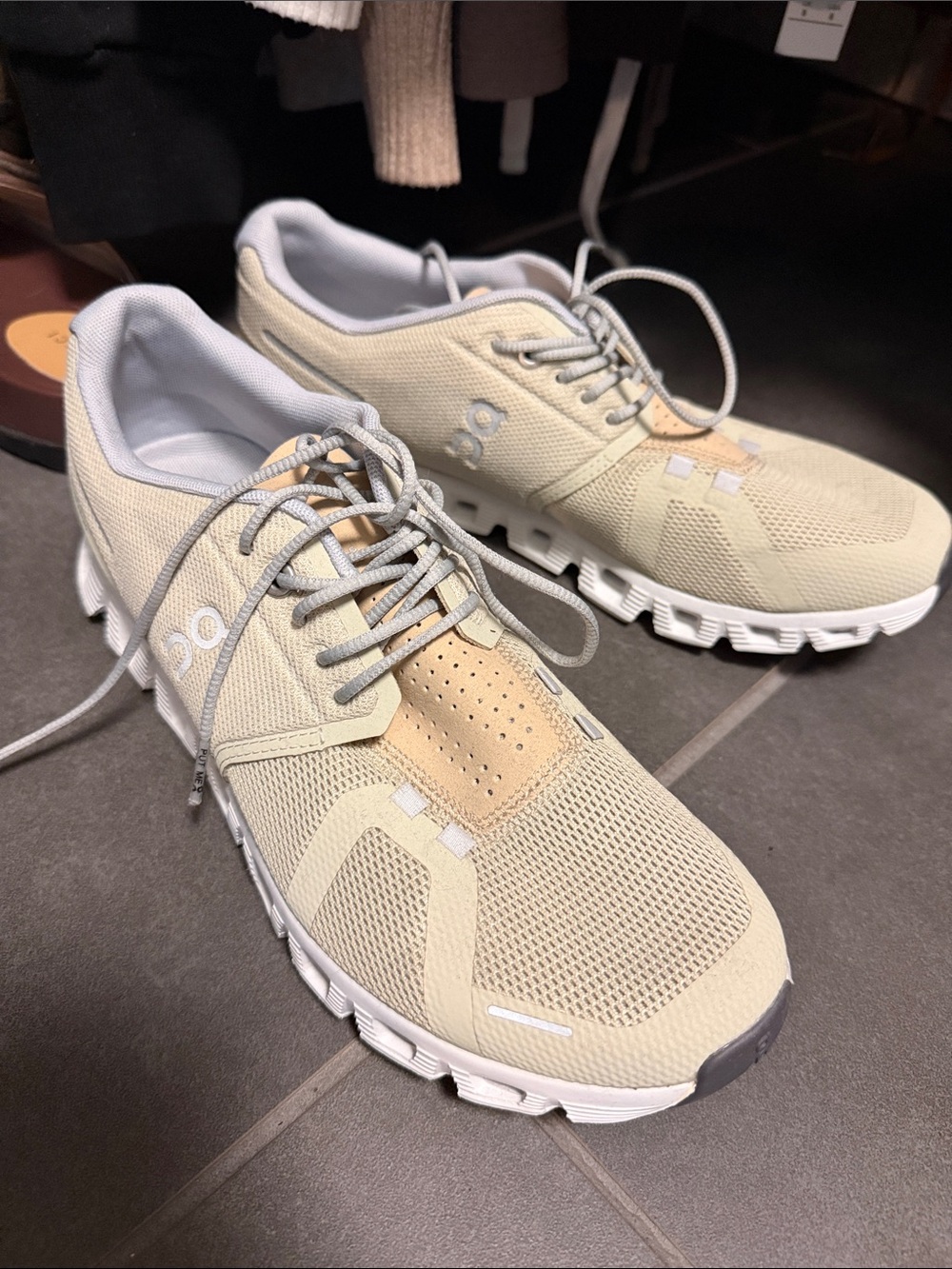 On Running Light Green and Beige Cloud-Style Athletic Sneakers